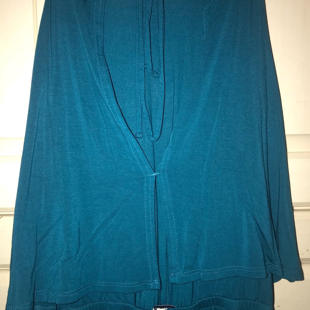 Short, teal/blue dress.